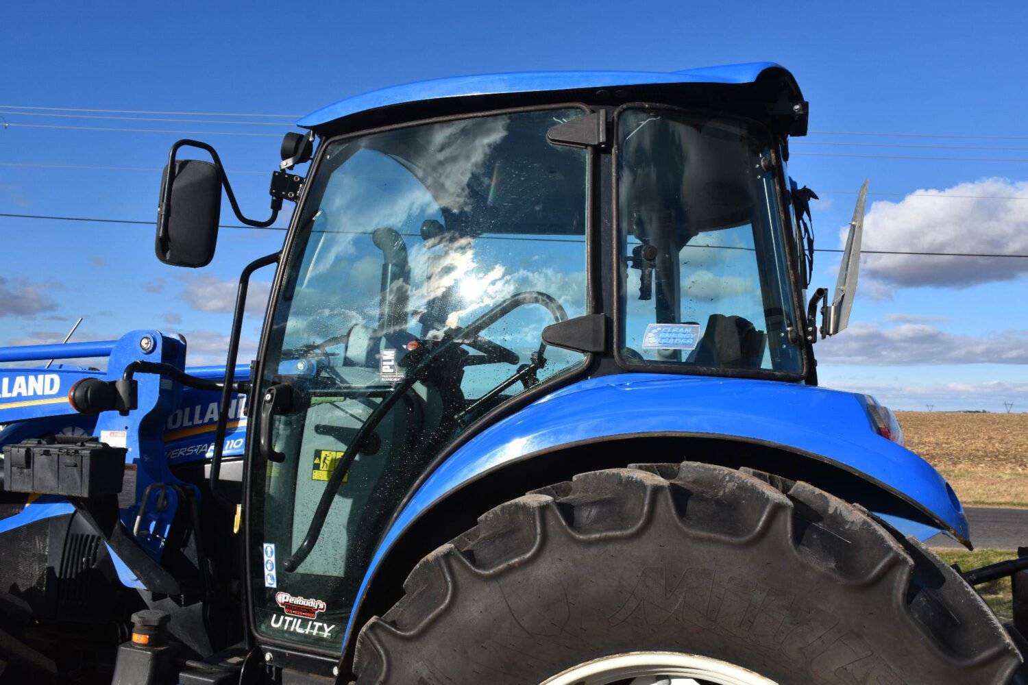 1new-holland-powerstar-110-mfwd-tractor-w-loader-2_7dbb4ba668374830a1af48ef52501742