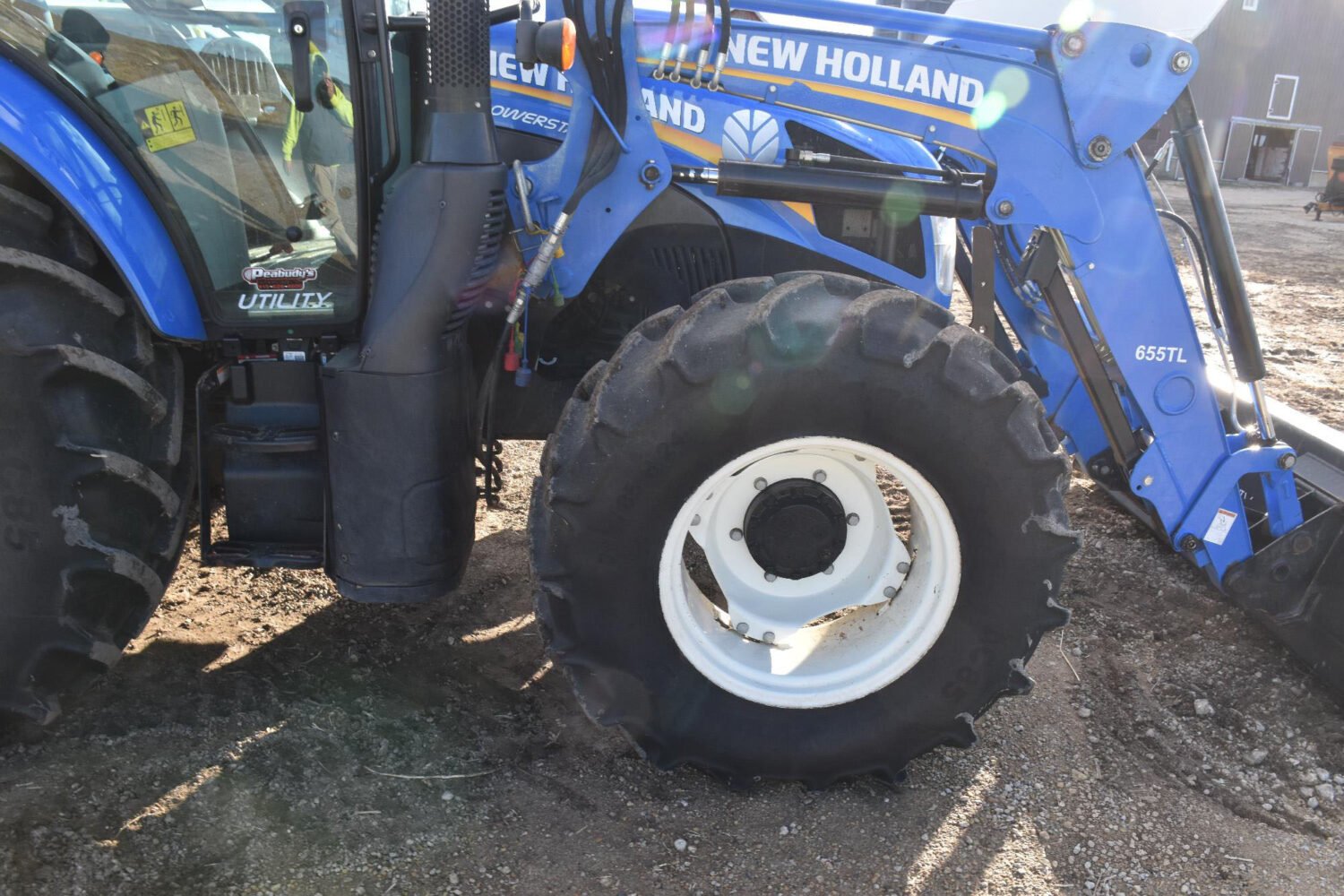 1new-holland-powerstar-110-mfwd-tractor-w-loader-2_c35448ec54704861807f5bc44f6a7462