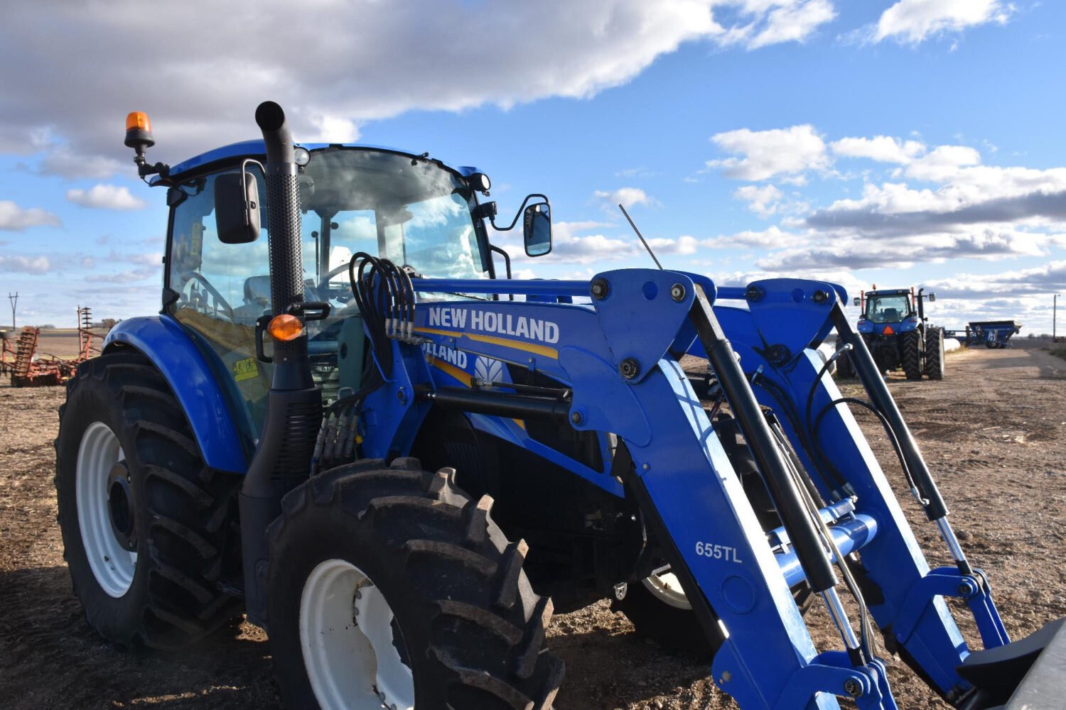 1new-holland-powerstar-110-mfwd-tractor-w-loader-2_e1fb22e339cc493ab0b87854726e768d